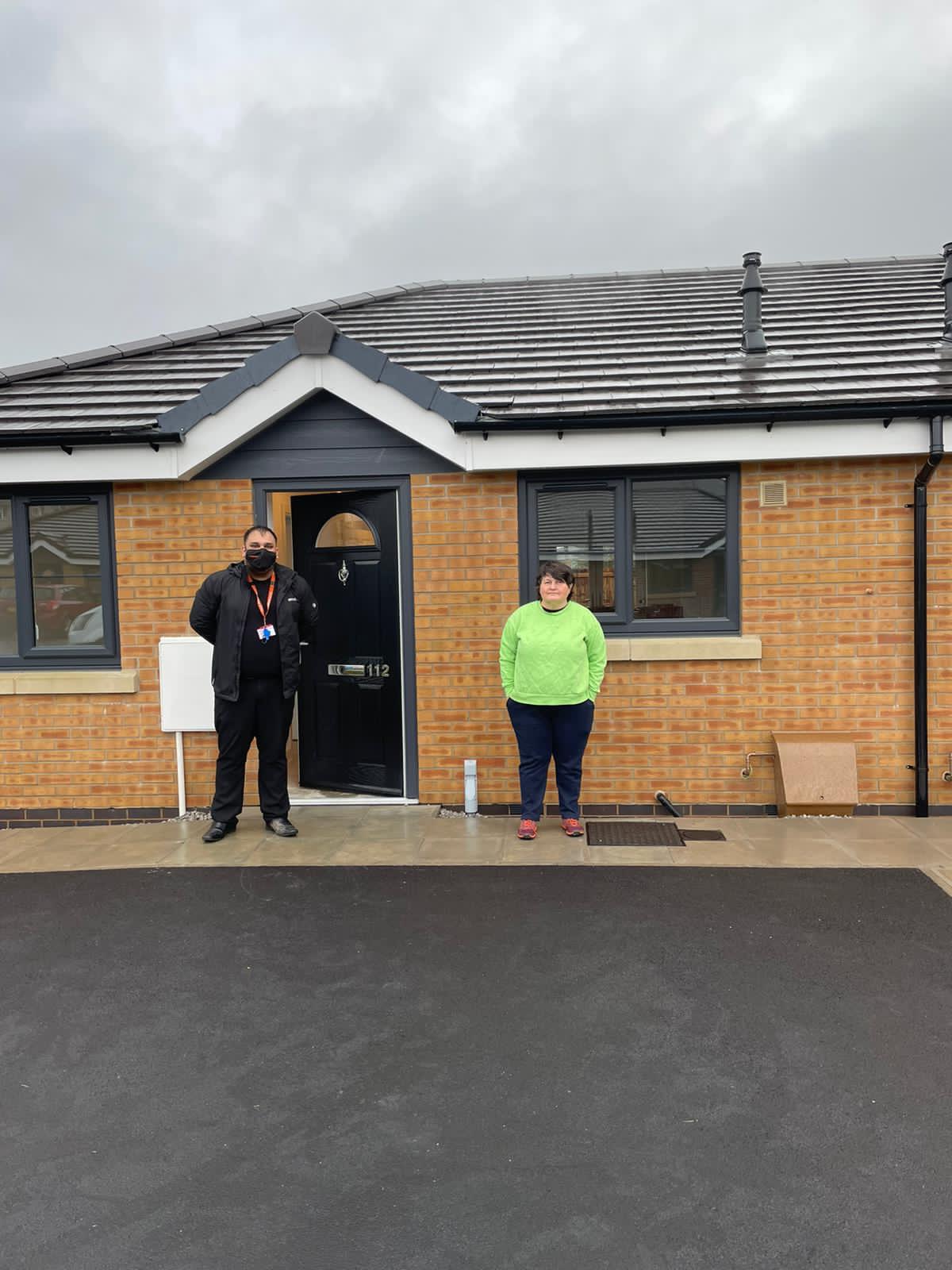 Resident Annette and Calico Housing Officer, Mohammed Naeed